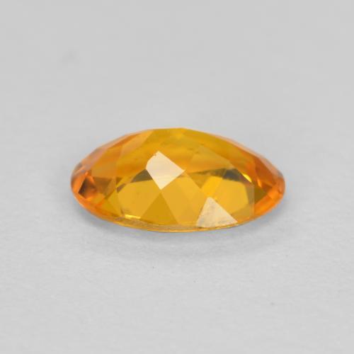 Clinohumite Abricot orange naturelle Coupe ovale, 0.43 ct, SI