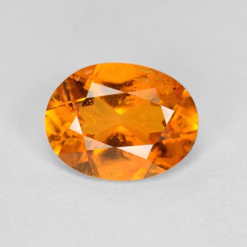 Clinohumite orange moyen naturelle coupe ovale, 1,18 ct, SI-I1