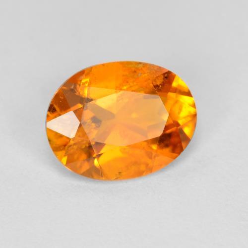 Clinohumite orange moyen naturelle coupe ovale, 1,18 ct, SI-I1