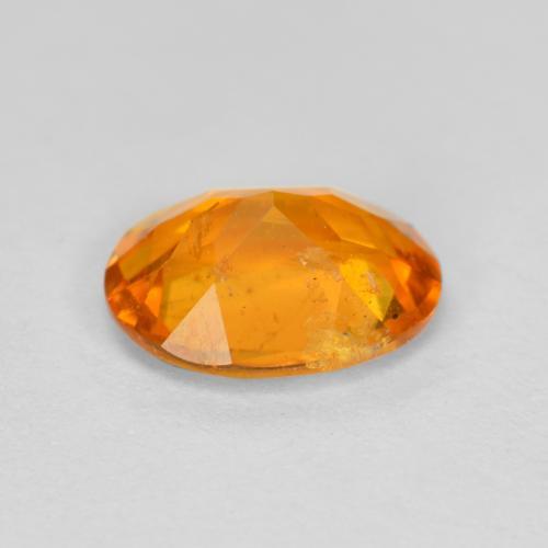 Clinohumite orange moyen naturelle coupe ovale, 1,18 ct, SI-I1