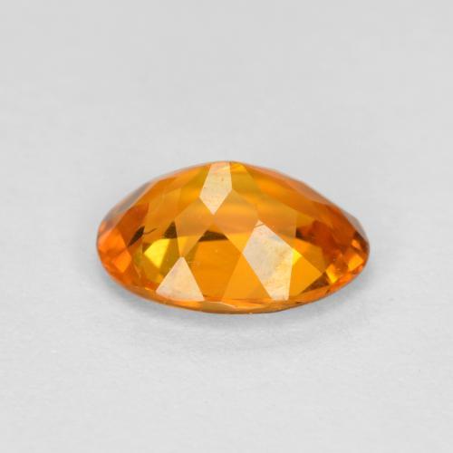 Clinohumite Orange moyen naturelle Coupe ovale, 0.74 ct, SI