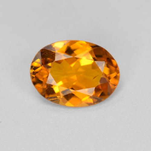 Clinohumite Abricot orange naturelle Coupe ovale, 0.66 ct, VS