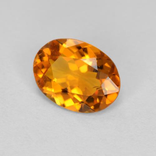 Clinohumite Abricot orange naturelle Coupe ovale, 0.66 ct, VS