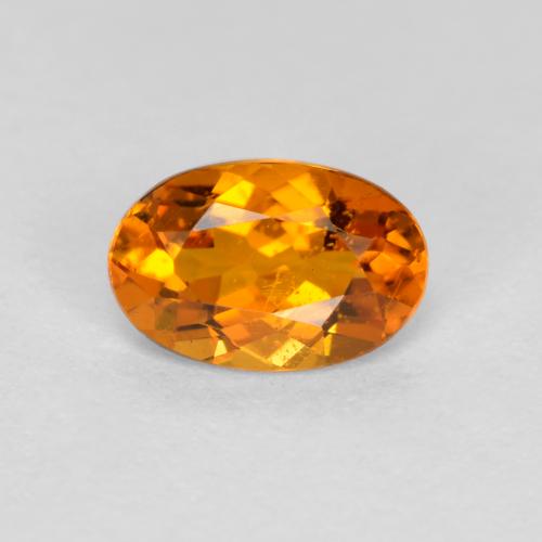 Clinohumite Orange foncé naturelle Coupe ovale, 0.41 ct, VS-SI