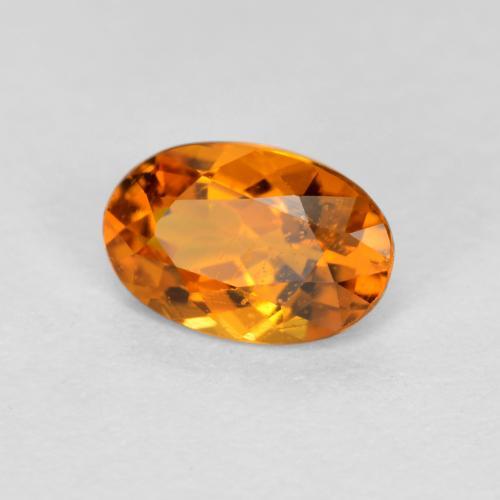 Clinohumite Orange foncé naturelle Coupe ovale, 0.41 ct, VS-SI