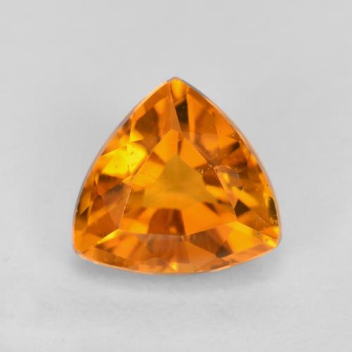 Clinohumite orange naturelle trillion, 0,59 ct, VS