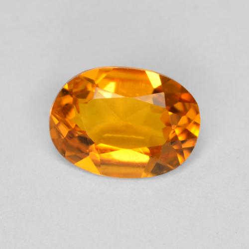 Clinohumite orange naturelle coupe ovale, 0,41 ct, VS
