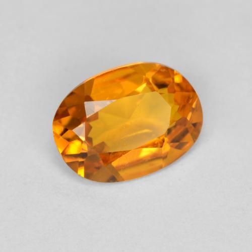 Clinohumite orange naturelle coupe ovale, 0,41 ct, VS
