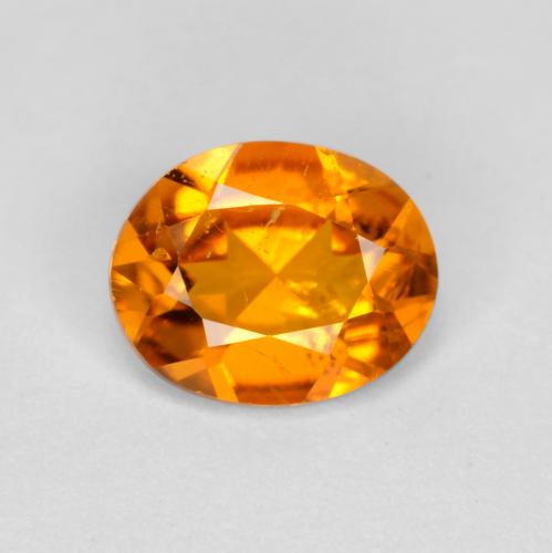 Clinohumite orange naturelle coupe ovale, 0,54 ct, SI
