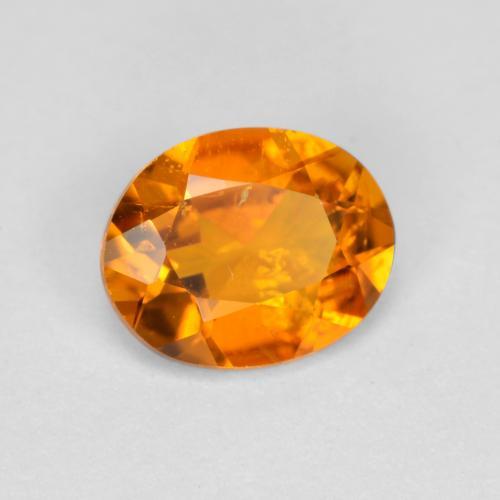 Clinohumite orange naturelle coupe ovale, 0,54 ct, SI