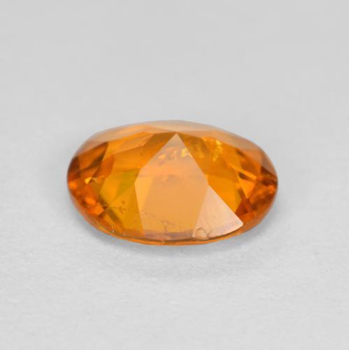 Clinohumite orange naturelle coupe ovale, 0,54 ct, SI