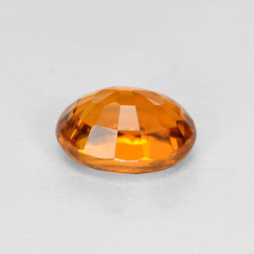 Clinohumite Abricot orange naturelle Coupe ovale, 0.38 ct, VS