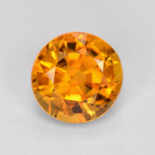 Clinohumite orange naturelle coupe roude, 0,48 ct, VS