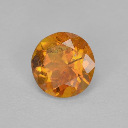 Clinohumite orange moyen naturelle coupe roude, 0,63 ct, SI