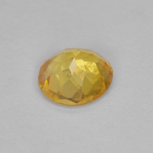 Clinohumite jaune naturelle coupe roude, 0,57 ct, VS-SI