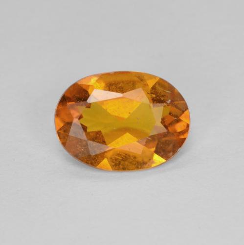 Clinohumite orange naturelle coupe ovale, 0,94 ct, SI