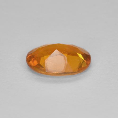 Clinohumite orange naturelle coupe ovale, 0,94 ct, SI