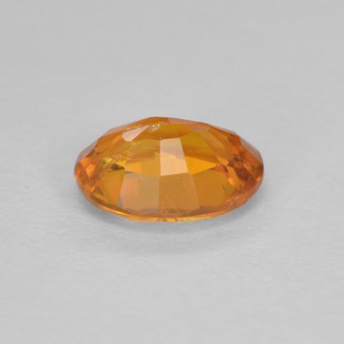 Clinohumite orange naturelle coupe ovale, 0,91 ct, SI