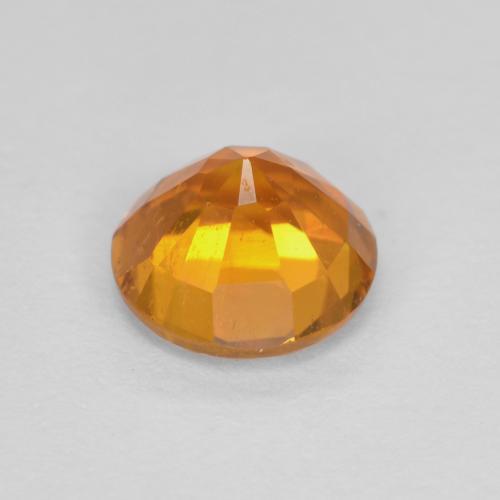 Clinohumite Orange moyen naturelle Coupe roude, 0.91 ct, SI