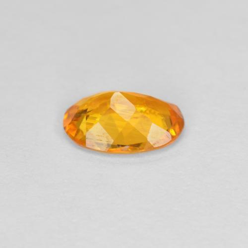 Clinohumite Abricot orange naturelle Coupe ovale, 0.60 ct, SI