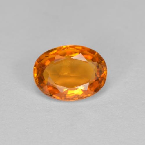 Clinohumite Orange moyen naturelle Coupe ovale, 0.81 ct, VS-SI