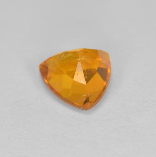 Clinohumite orange naturelle trillion, 1,20 ct, SI