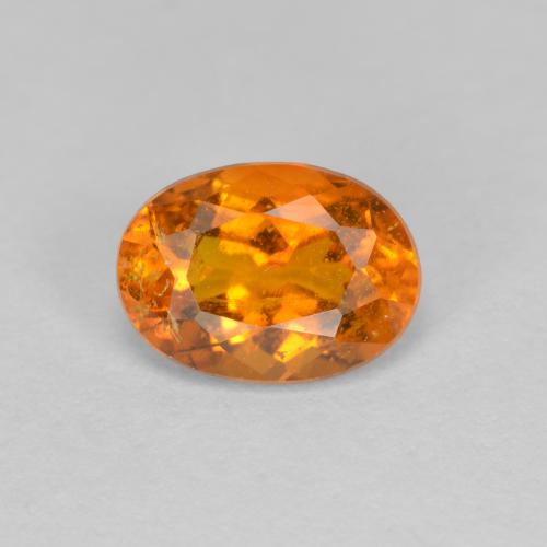 Clinohumite orange naturelle coupe ovale, 1,15 ct, SI