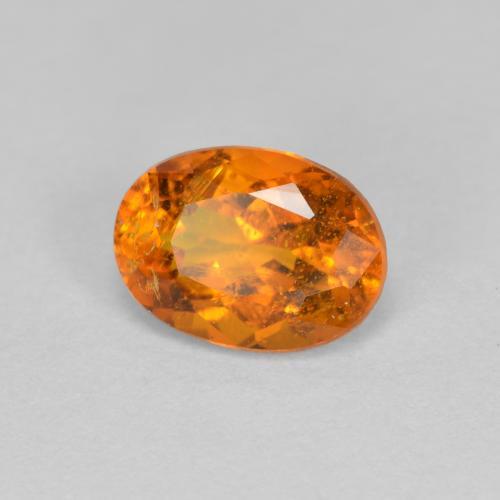 Clinohumite orange naturelle coupe ovale, 1,15 ct, SI