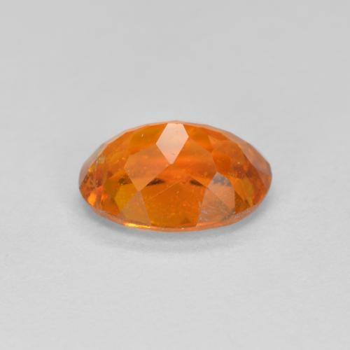 Clinohumite orange naturelle coupe ovale, 1,15 ct, SI