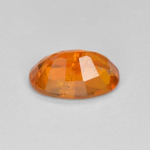 Clinohumite orange naturelle coupe ovale, 1,19 ct, SI-I1
