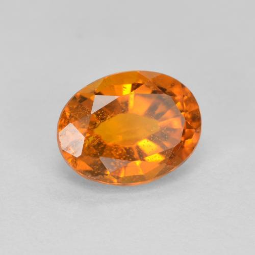 Clinohumite orange naturelle coupe ovale, 1,38 ct, VS-SI