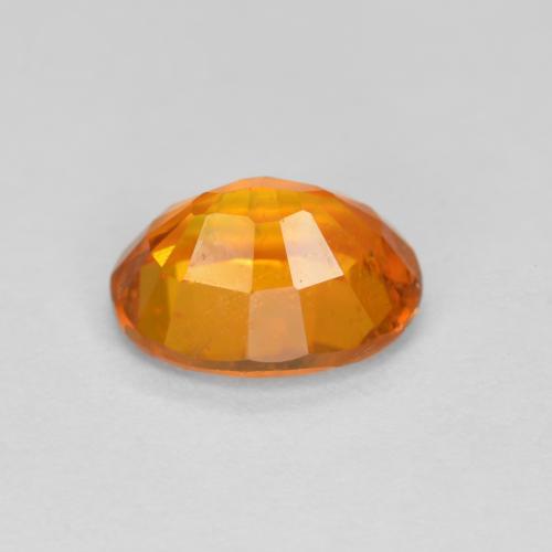 Clinohumite orange naturelle coupe ovale, 1,38 ct, VS-SI