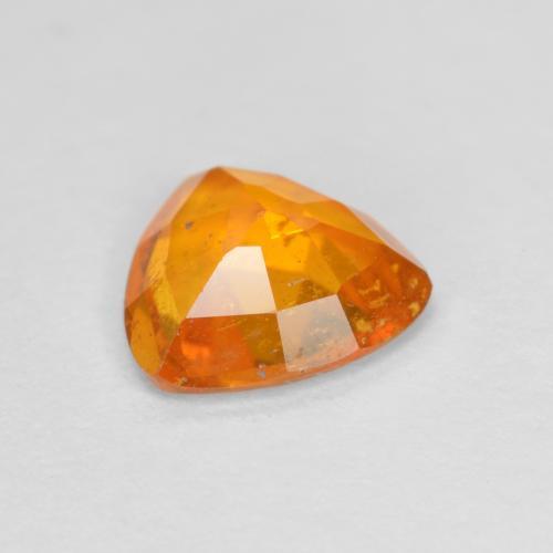 Clinohumite Ambre orange naturelle Trillion, 0.83 ct, SI