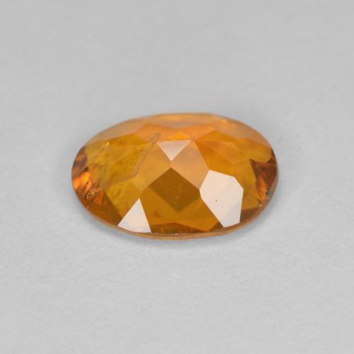 Clinohumite Abricot orange naturelle Coupe ovale, 1.20 ct, SI