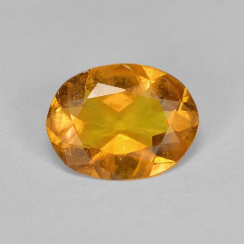 Clinohumite orange naturelle coupe ovale, 1,33 ct, SI