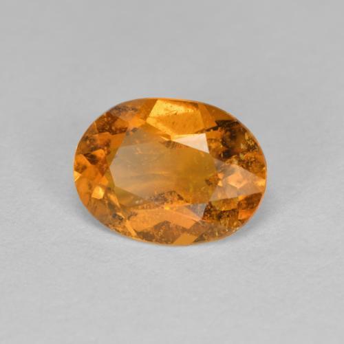 Clinohumite Orange moyen naturelle Coupe ovale, 1.21 ct, SI