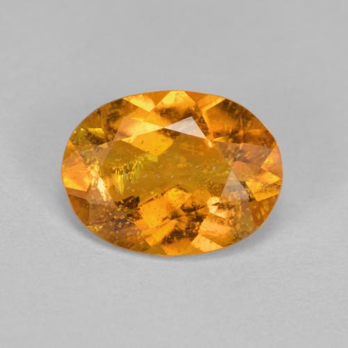 Clinohumite orange naturelle coupe ovale, 1,43 ct, SI