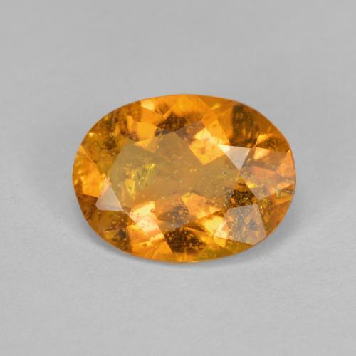 Clinohumite orange naturelle coupe ovale, 1,43 ct, SI