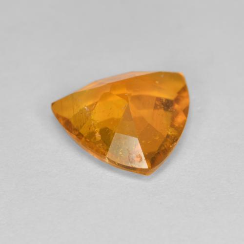 Clinohumite orange naturelle trillion, 1,45 ct, SI