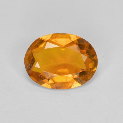 Clinohumite orange naturelle coupe ovale, 1,34 ct, SI