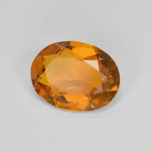Clinohumite orange naturelle coupe ovale, 1,34 ct, SI