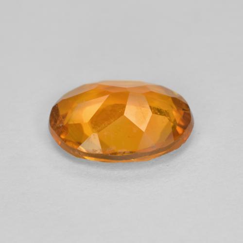 Clinohumite orange naturelle coupe ovale, 1,34 ct, SI
