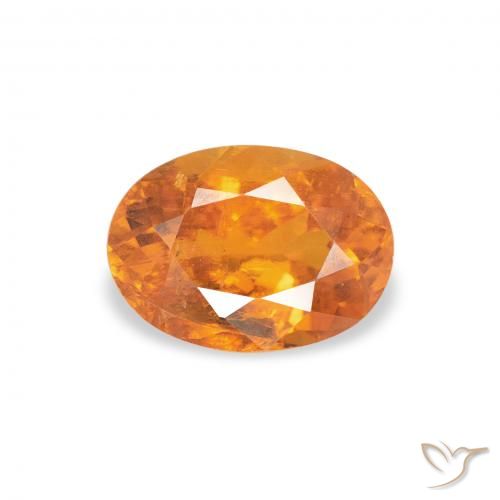 0.86ct Naturel Orange vif Clinohumite, ovale, SI-I1