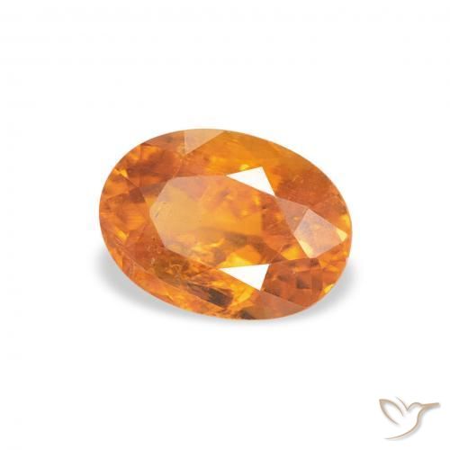 Clinohumite Orange vif naturelle ovale, 0.86 ct, SI-I1