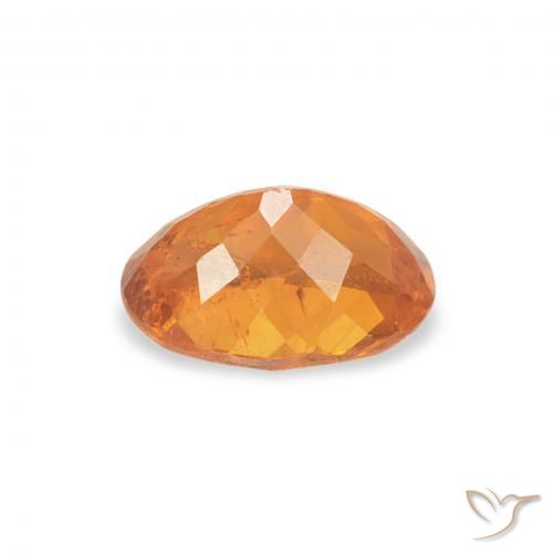 Clinohumite Orange vif naturelle ovale, 0.86 ct, SI-I1