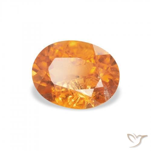 Clinohumite Orange moyen naturelle ovale, 1.29 ct, SI-I1