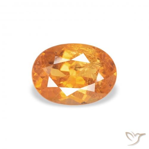 0.87ct Naturel Orange moyen Clinohumite, ovale, SI