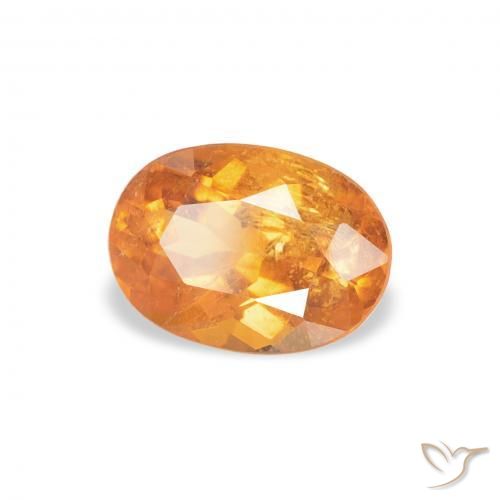 Clinohumite Orange moyen naturelle ovale, 0.87 ct, SI