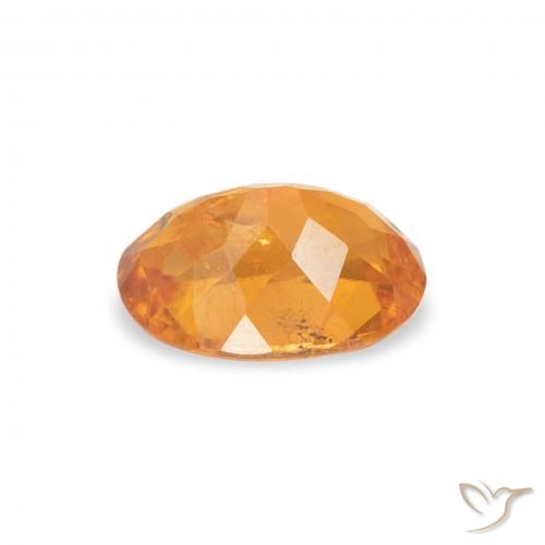 Clinohumite Orange moyen naturelle ovale, 0.87 ct, SI