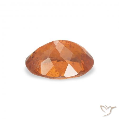 Clinohumite Orange foncé naturelle ovale, 0.89 ct, SI